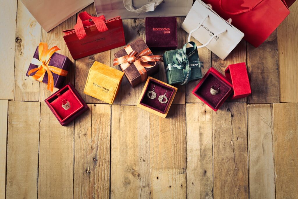 Assorted Gift Boxes on Brown Wooden Floor Surface